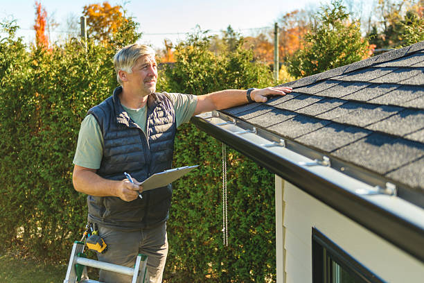 Professional Storm Damage Roof Repair technician working in Blue Rapids, KS